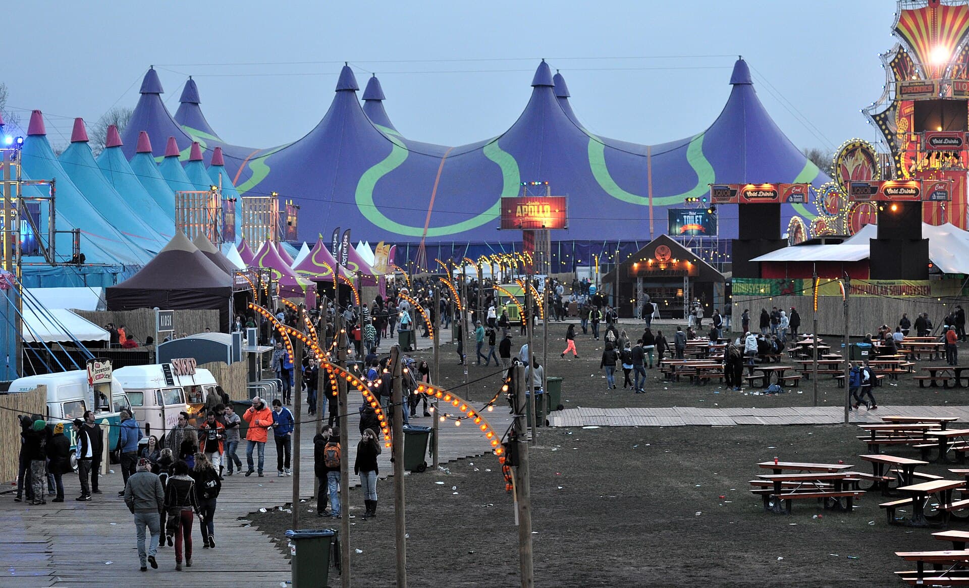Shuttle buses and queues outside 's-Hertogenbosch railway station on a festival weekend