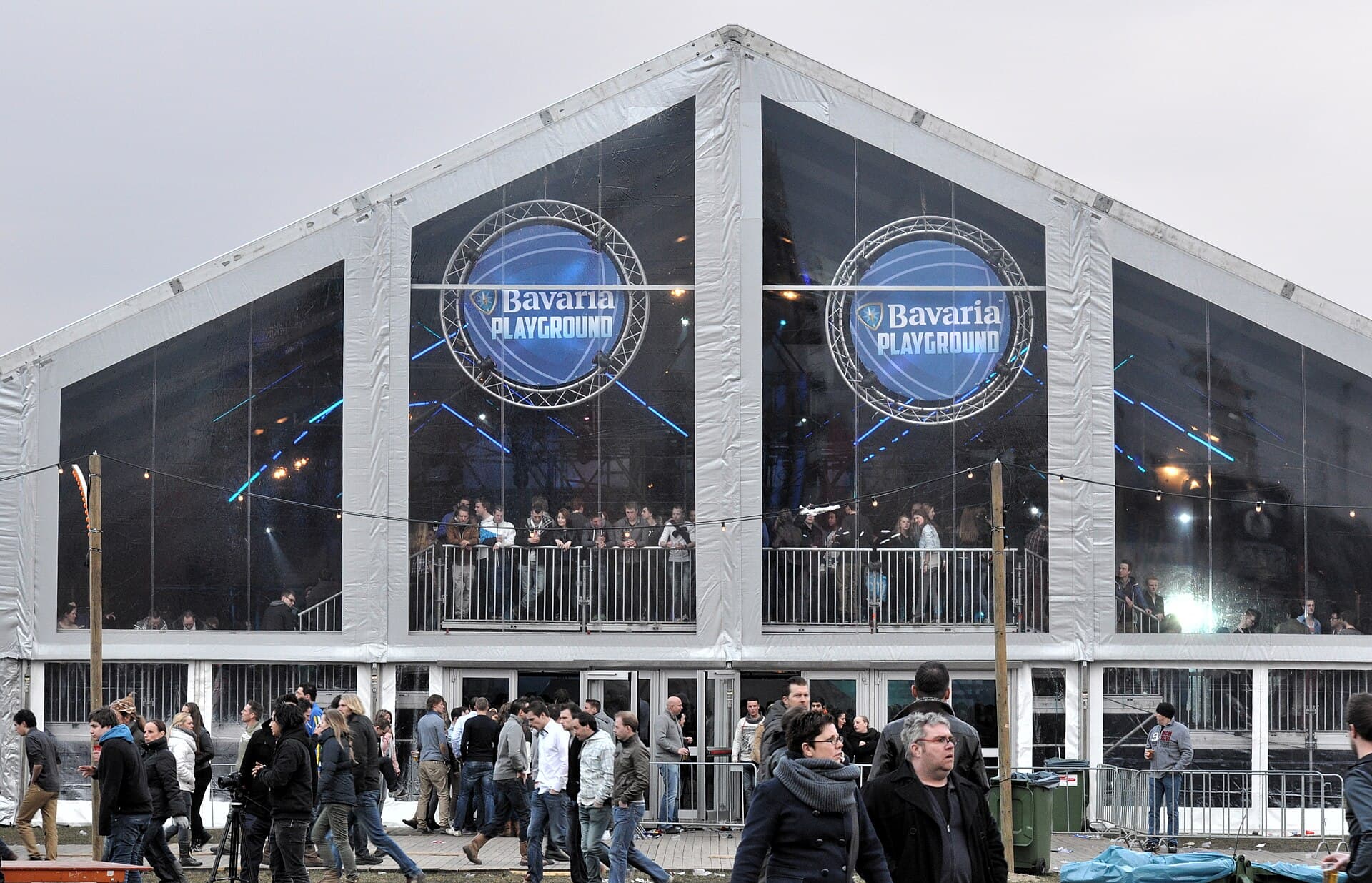 Paaspop visitors queuing at the entrance with wristbands in the late afternoon