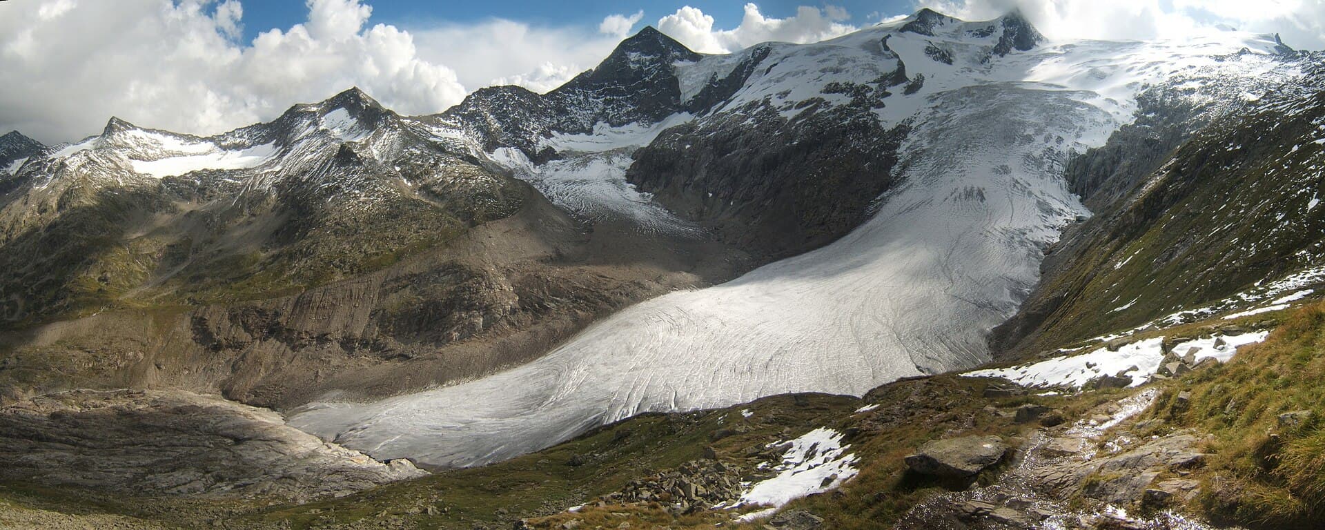 Snow-covered Pic Blanc glacier area above Alpe d'Huez at sunrise