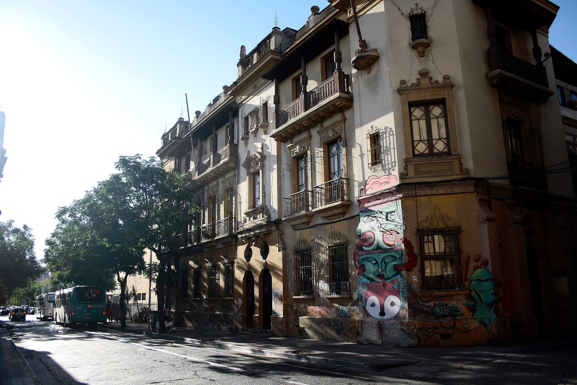 Evening street in a central Santiago neighbourhood with Metro entrance and cafes