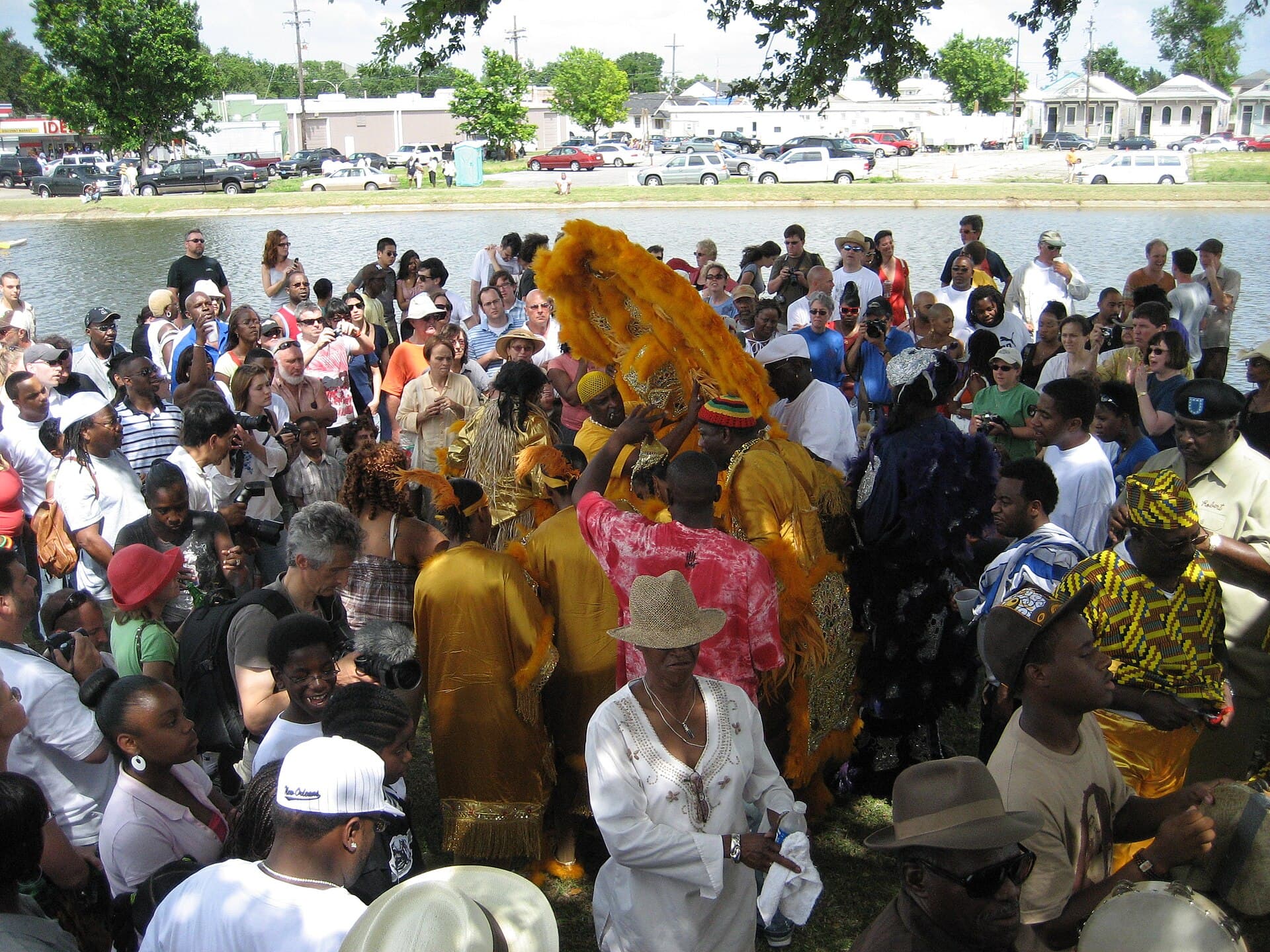 Mardi Gras Indian Big Chief in a beaded and feathered suit on a New Orleans street on Mardi Gras Day