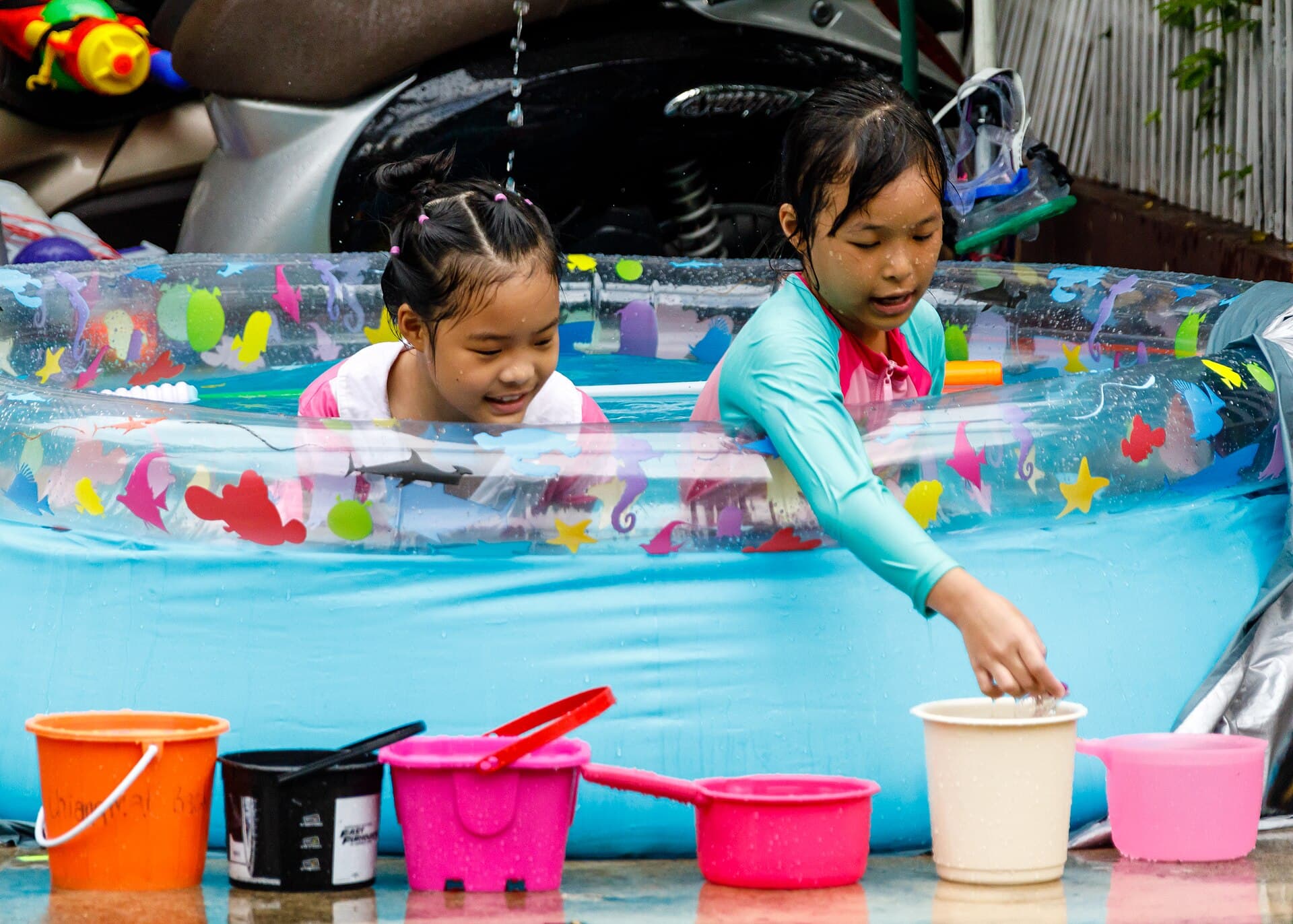 Revellers with buckets and water guns in Tha Phae Gate Square, Chiang Mai, during Songkran