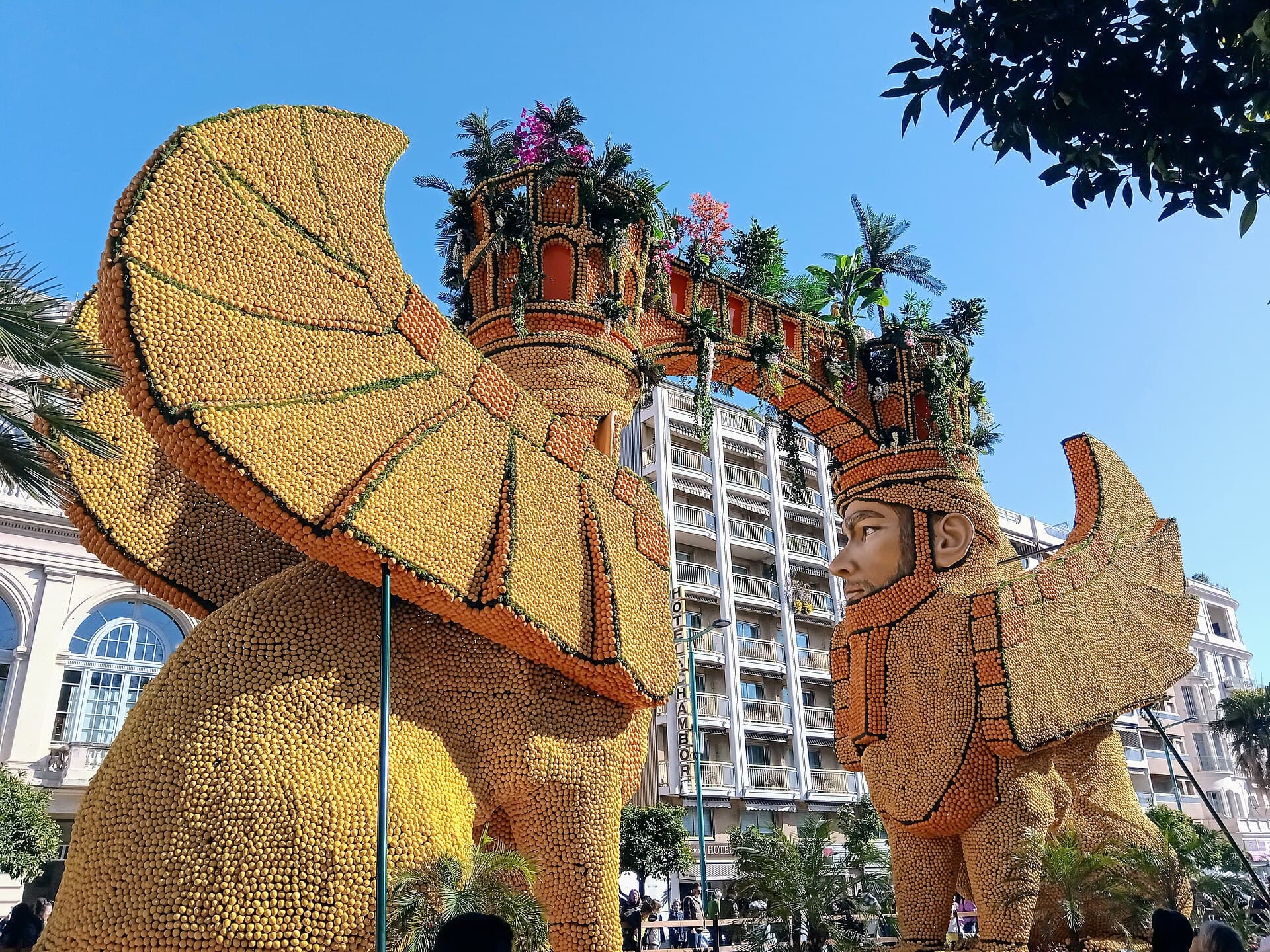 Float covered in lemons and oranges passing along the Promenade du Soleil in Menton during a Corso des fruits d'or