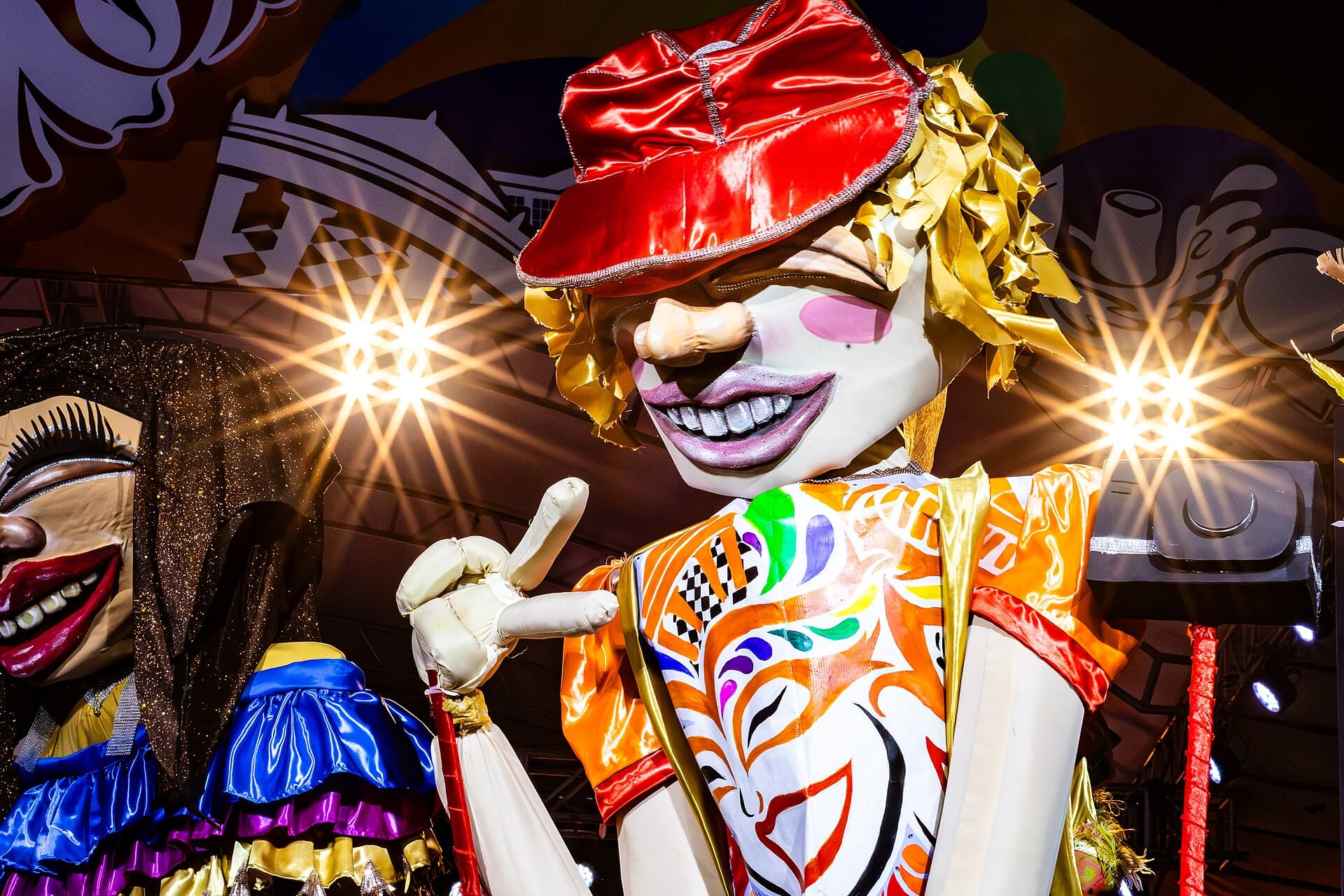 Papier-mâché higante heads displayed in an Angono workshop