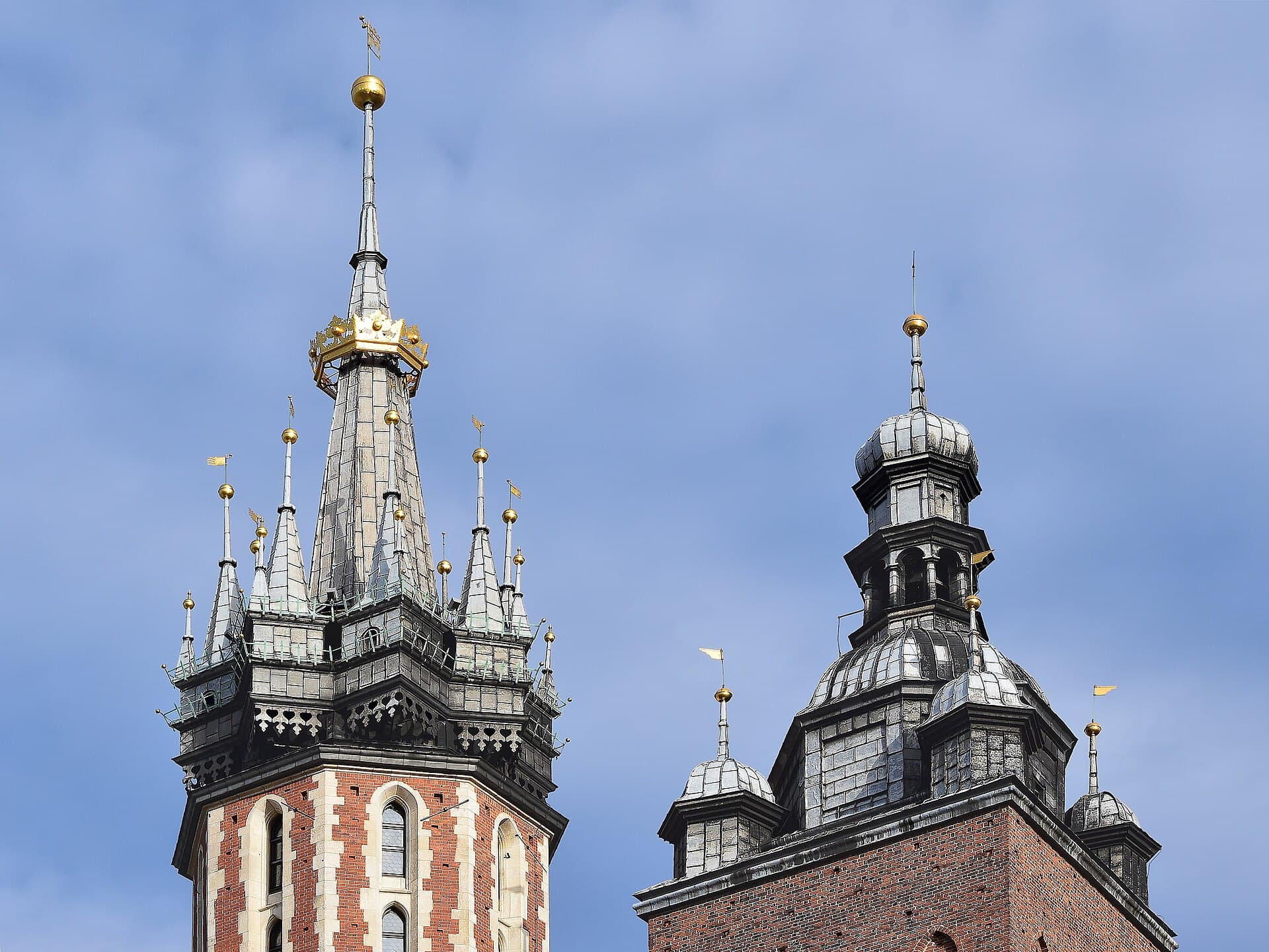 St. Mary's Basilica towers rising above the stalls on a winter evening