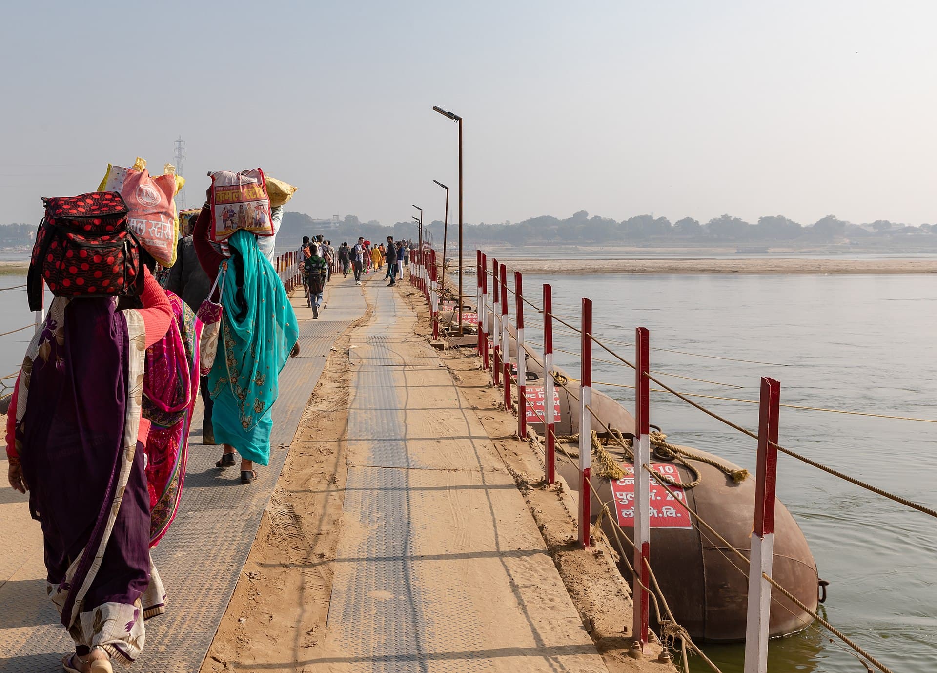 A kalpvasi camp of thatched huts on the sands of the Sangam at Magh Mela in Prayagraj
