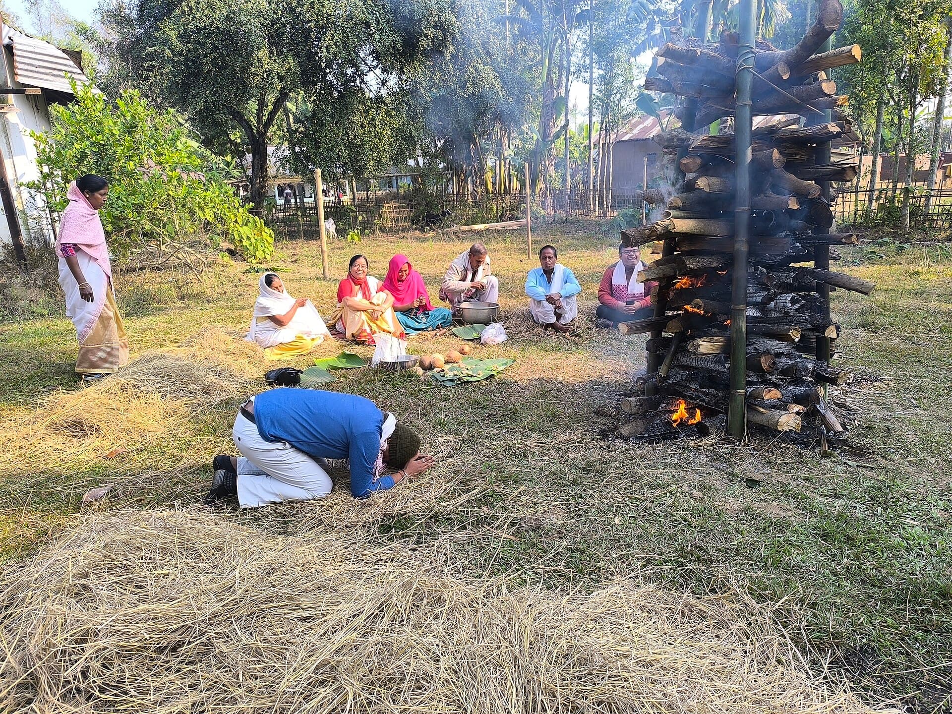 Close-up of a dhol player and a pepa player at a Bihu stage