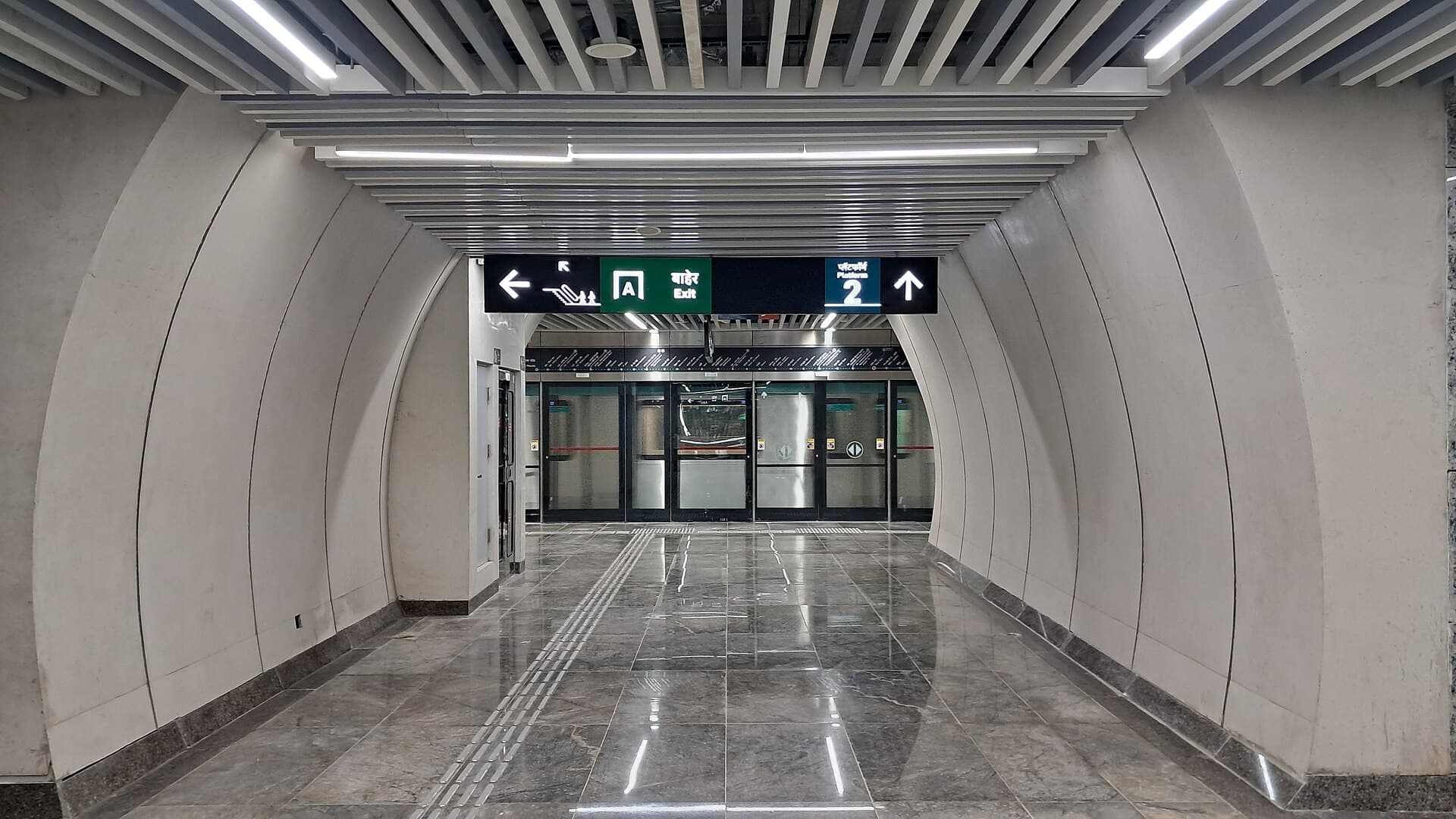 Mumbai Metro Line 3 Aqua Line train at an underground platform