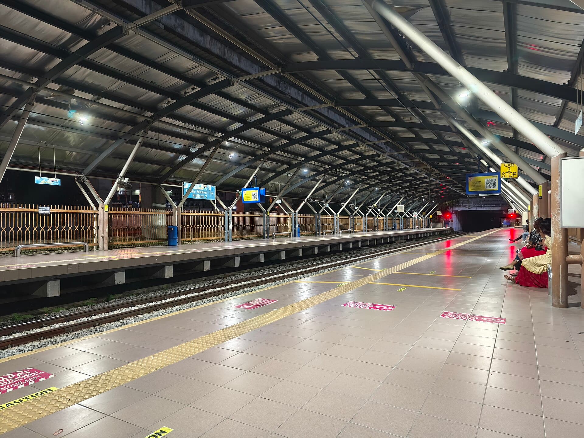 The KTM Komuter platform at Batu Caves station packed with festival visitors