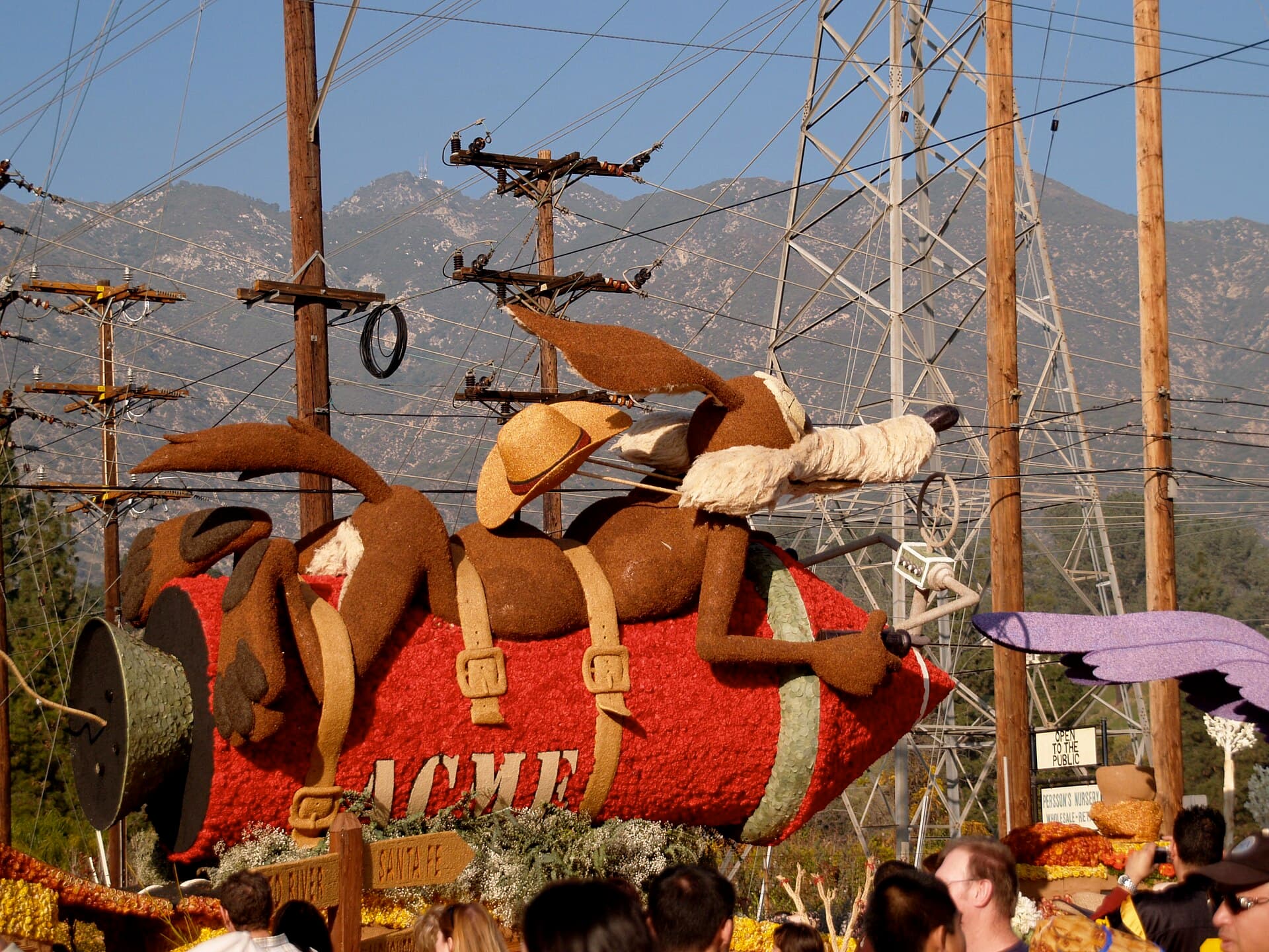 Rose Parade floats parked for viewing on Sierra Madre Boulevard at the Floatfest showcase near Pasadena High School