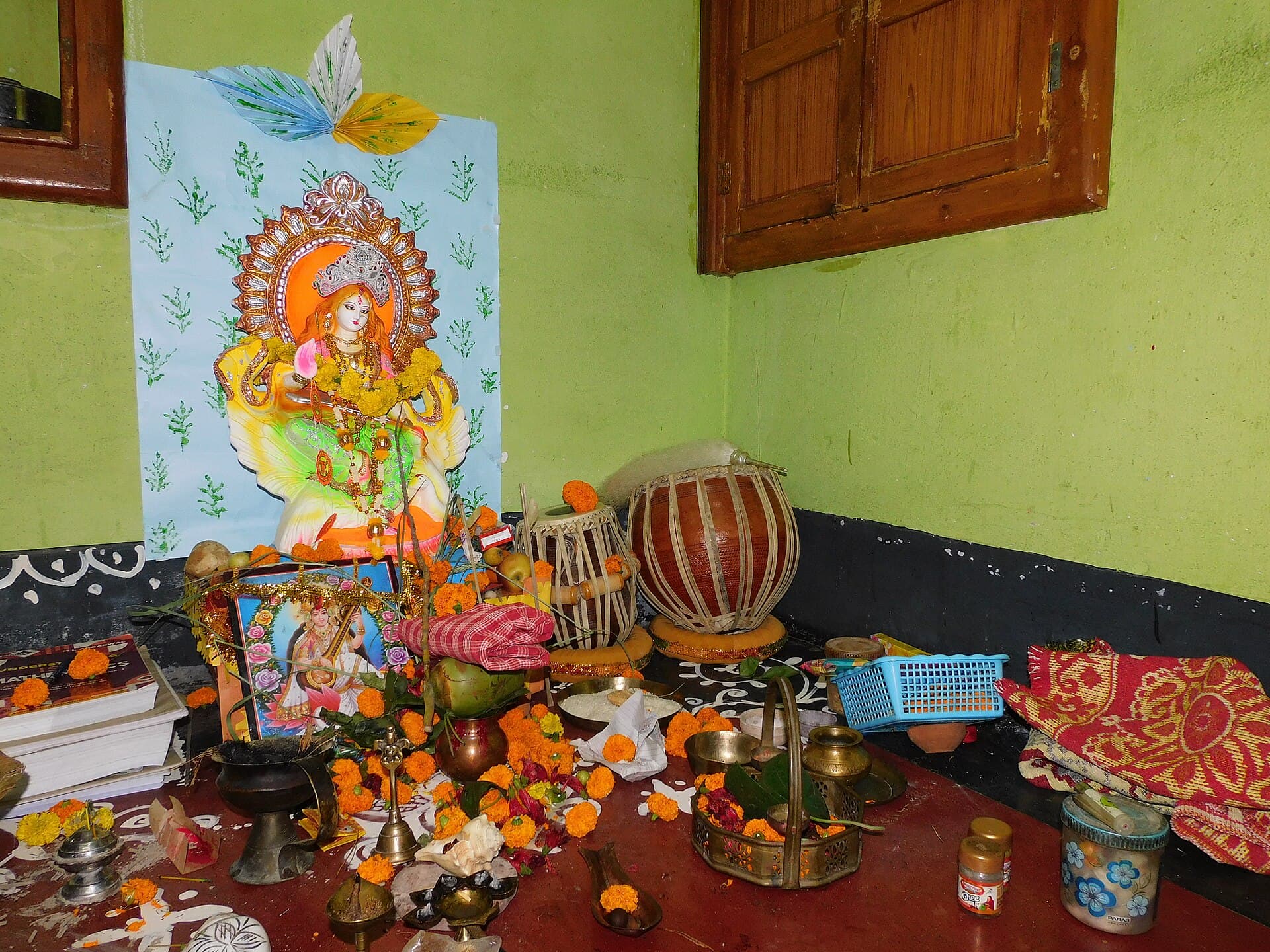 Khichuri bhog being served at a Saraswati Puja lunch in West Bengal