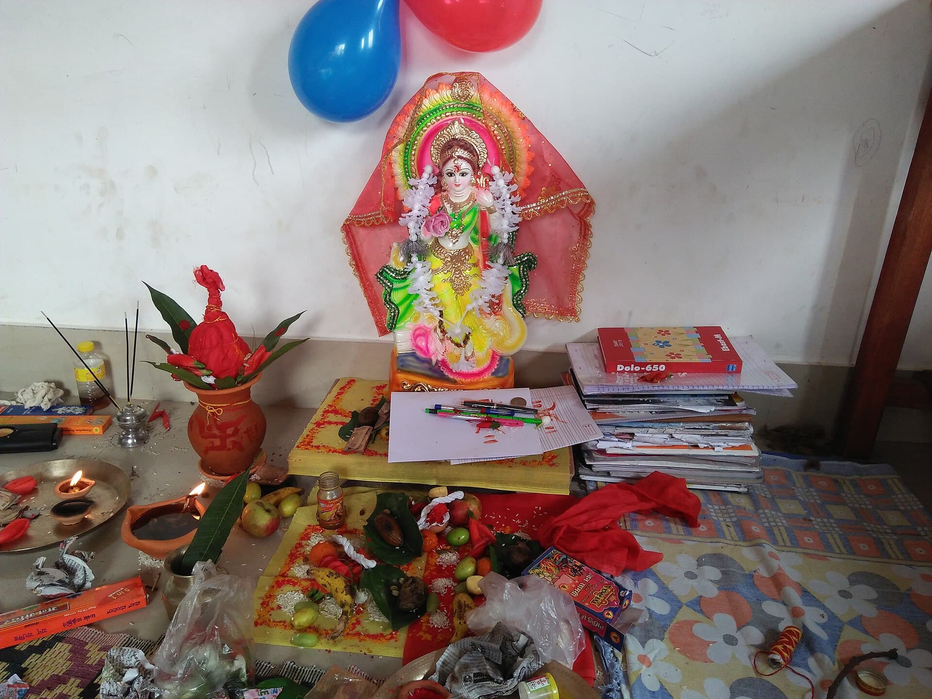 Saraswati idols with veena on display at a Kumartuli workshop in Kolkata before Saraswati Puja