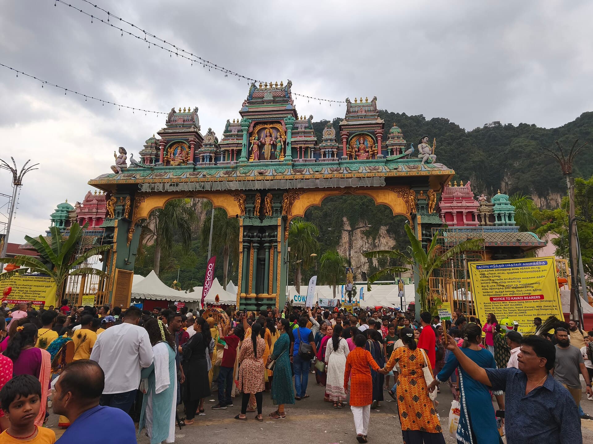 The silver chariot leaving the Sri Mahamariamman Temple on Jalan Tun H.S. Lee surrounded by devotees