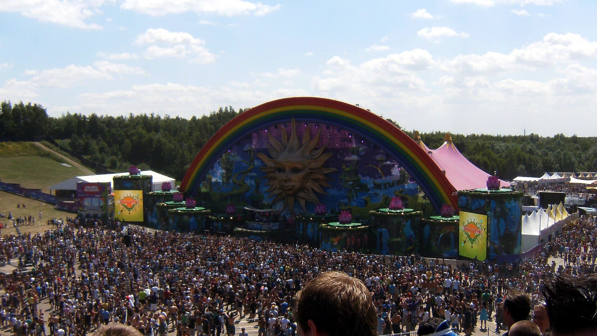 The MainStage interior at night with lasers and a packed crowd