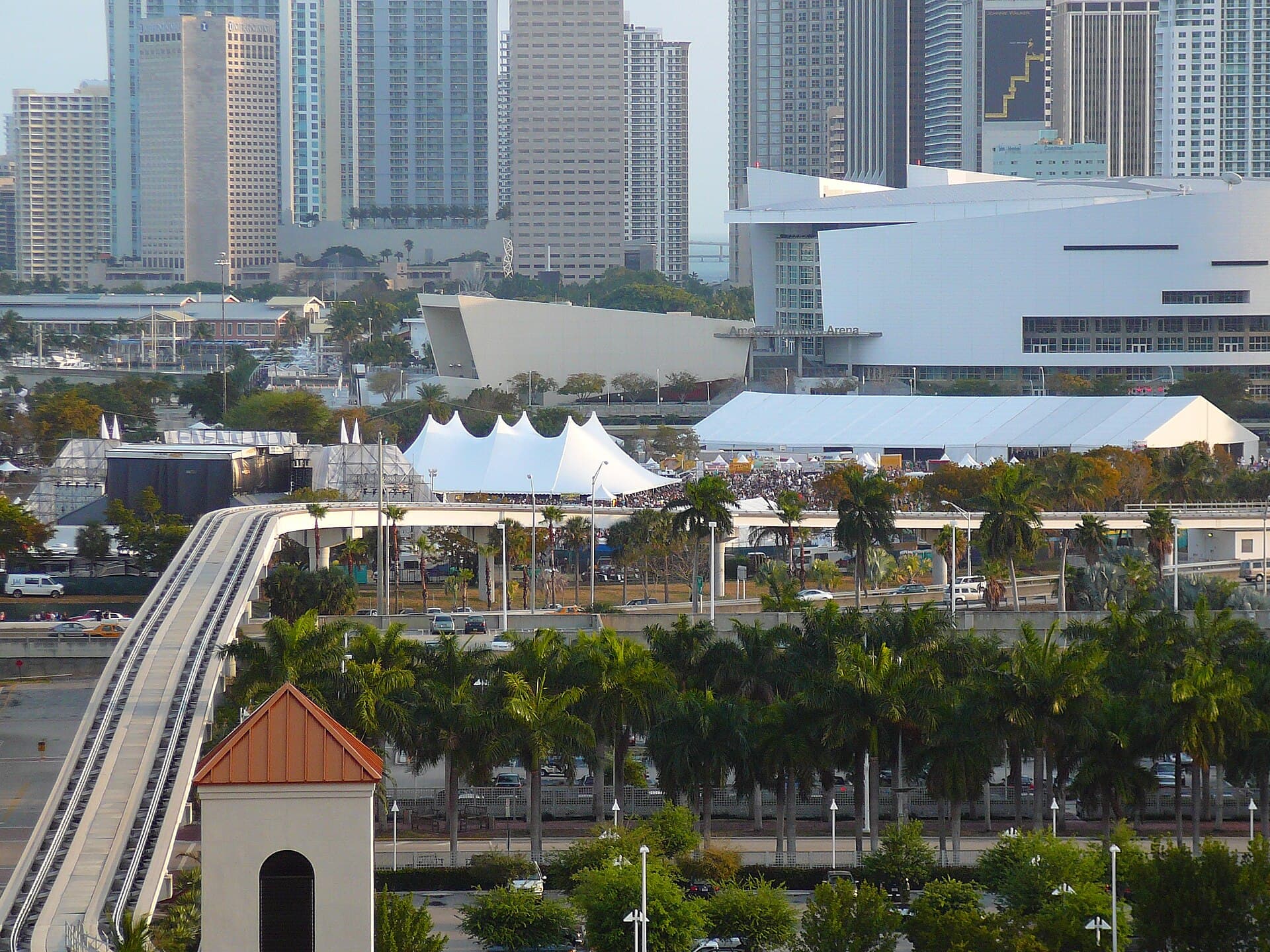 Metromover train passing Bayfront Park station on festival weekend in Downtown Miami