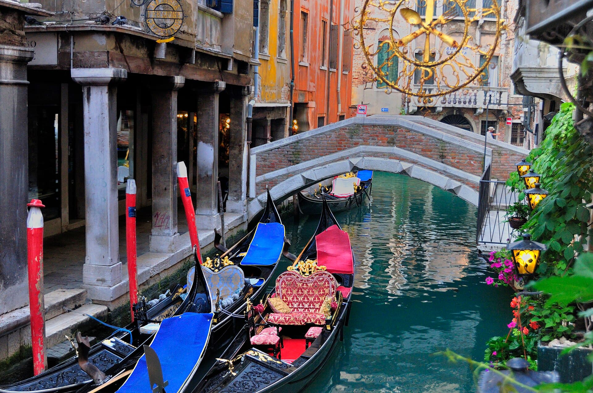 Fog over the Venetian lagoon at dawn with gondolas moored at the Molo in front of Piazza San Marco