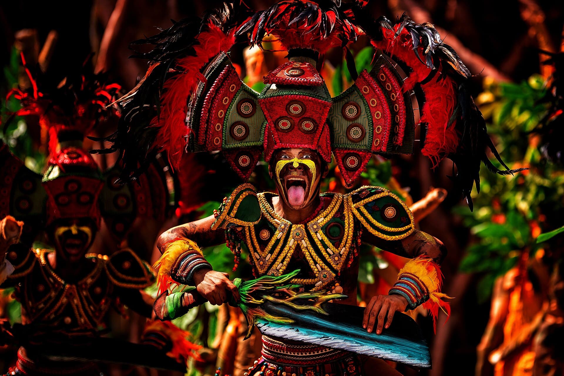 Dagoy, the giant Dinagyang mascot of a young Ati warrior with a drum, on display in Iloilo City