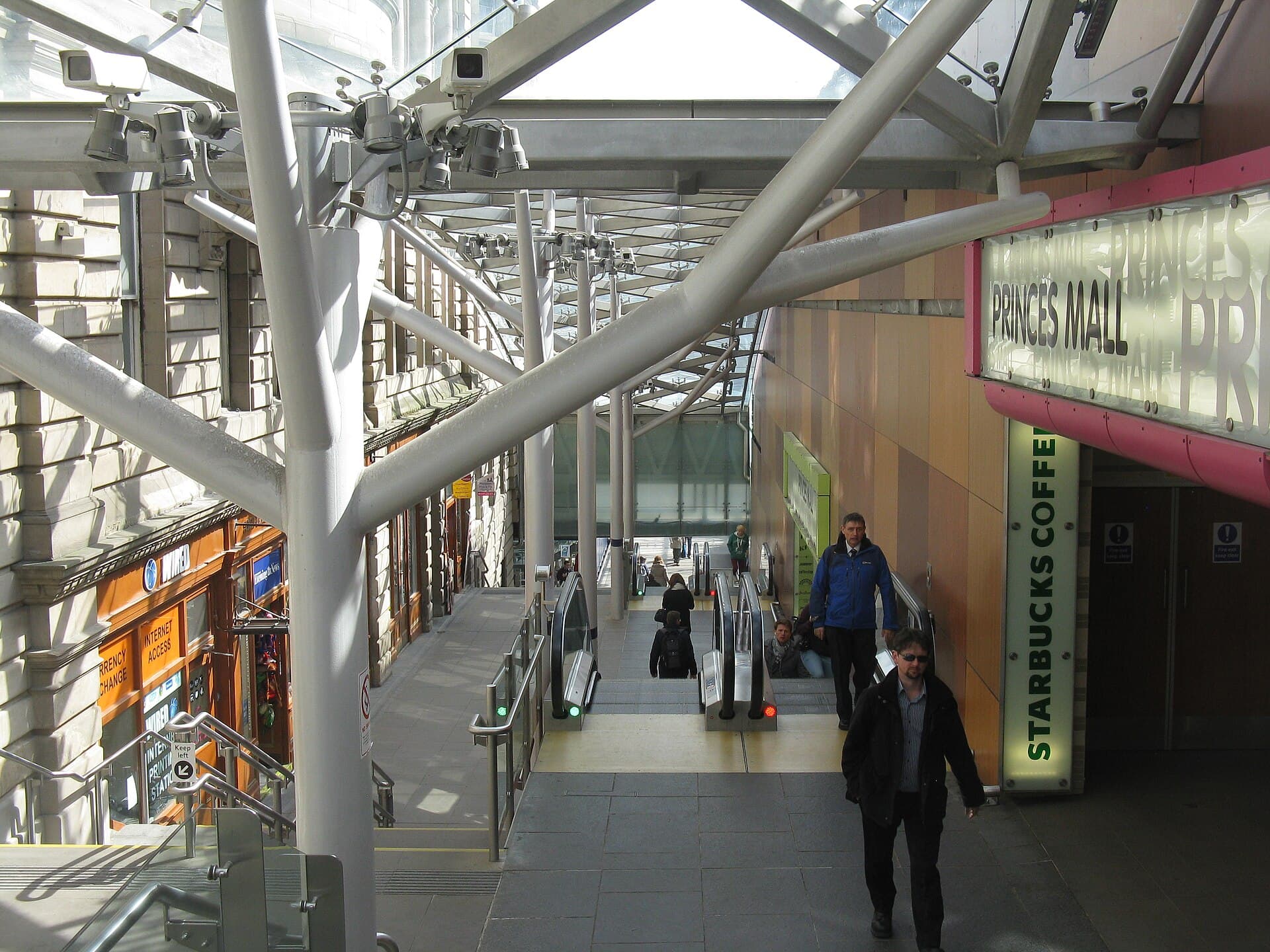 The Waverley Steps with covered escalators climbing from Waverley station to Princes Street
