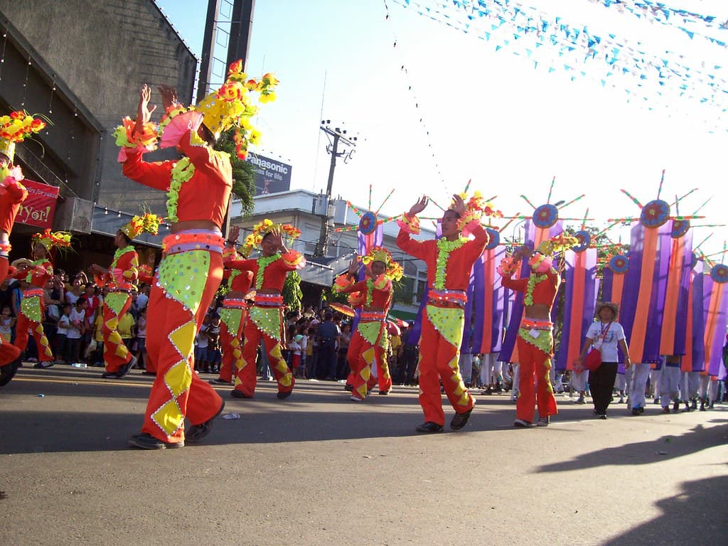 Spectators in the Cebu City Sports Center grandstand watching a Sinulog Ritual Showdown performance on the field