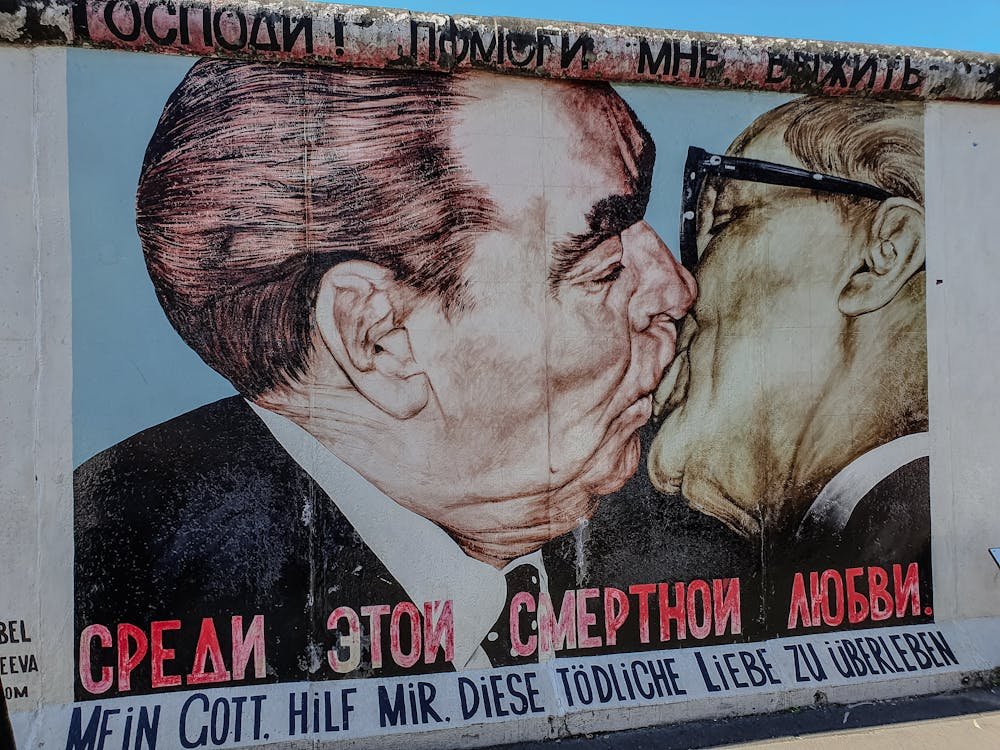 Iconic Fraternal Kiss mural at East Side Gallery - Berlin Wall art"