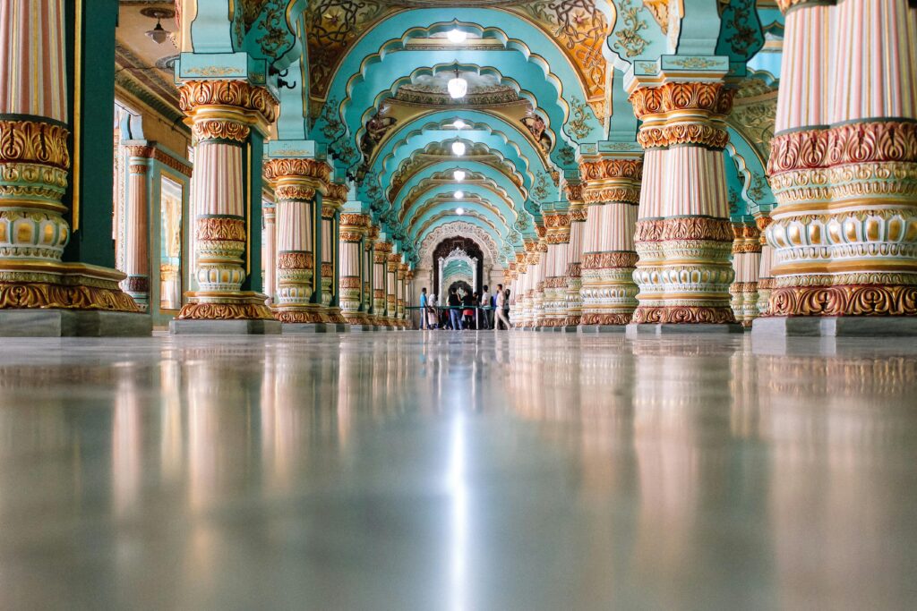 Intricately designed interior arches and pillars of Mysore Palace in Karnataka, India showcasing royal Indo-Saracenic architecture