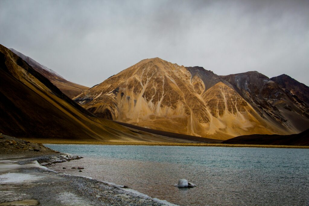 The stunning blue waters of Pangong Lake in Ladakh, one of the best places to visit in India for nature lovers